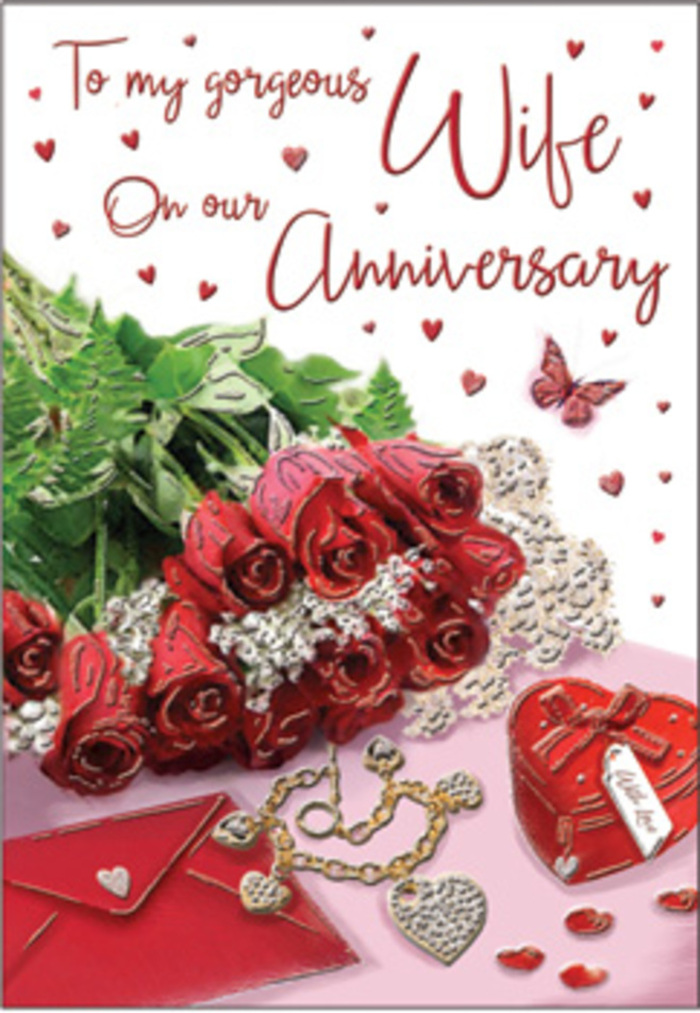 This anniversary card artwork presents a softly lit still life that could easily be imagined on a Cranham dining table, arranged just before a celebratory meal. Dominating the composition is a cluster of red roses, their petals plush and velvety, with concentric curls that build into full, romantic blooms. The colour is a rich crimson, warm rather than stark, and it sits beautifully against the deep green of the surrounding foliage, whose leaves are smooth, slightly glossy, and naturally curved. To the side, a cream-coloured envelope rests at a gentle angle, its clean lines and faint sheen hinting at the presence of a personal, handwritten anniversary note. Close by, a small heart-shaped box finished in an intense red tone adds a sense of mystery and excitement, as though it might hold jewellery or another cherished keepsake collected over shared years. A delicate necklace or bracelet snakes gracefully across the surface, its thin metal strand catching the soft light in tiny flashes. Around these main elements, miniature hearts are scattered like confetti, some clustered near the roses, others leading the eye toward the box and envelope. A single butterfly accent, light and airy, drifts across the design, bringing a hint of whimsy and transformation. The overall lighting is gentle, reminiscent of late-afternoon light filtering through the windows of a Cranham home, with mild shadows that lend depth without drama. Every detail, from the polished leaves to the curve of the jewellery, feels intentional and measured, as if composed by Florist Cranham to reflect the quiet, enduring romance of an anniversary evening spent close to home.